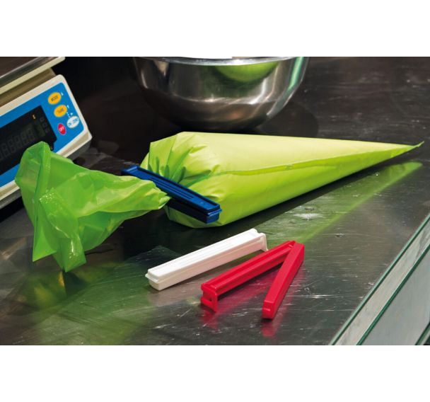 Clip pour fermeture de poches pâtissières