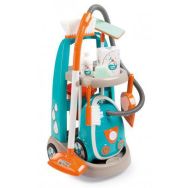 Le chariot de ménage et l'aspirateur