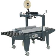 Machine à poser l'adhésif entrainement latérale